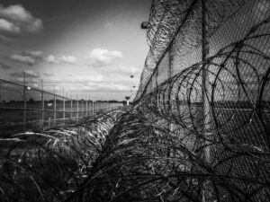 prison-fence-219264_1920 - Uyghur Hjelp