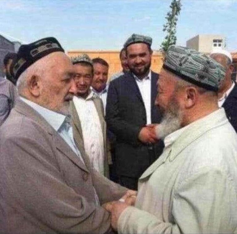 Muhemmet Salih is on the right, Ablimit Abdulla is on the left